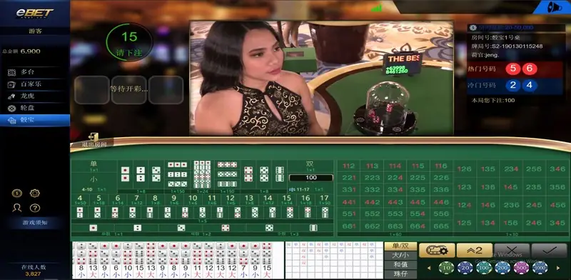 eBET Sic Bo dice shaker and live dealer at the table