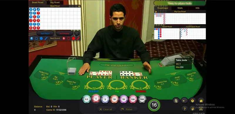 Ezugi live baccarat table with dealer and card shoe