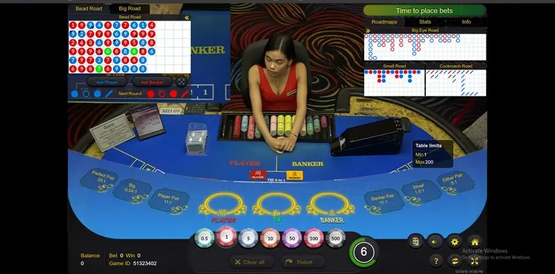 Ezugi Queenco live card table with a real dealer
