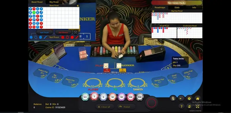 Queenco dealer at the Ezugi live card table
