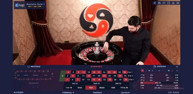 Ezugi roulette dealer spinning the wheel during a live round